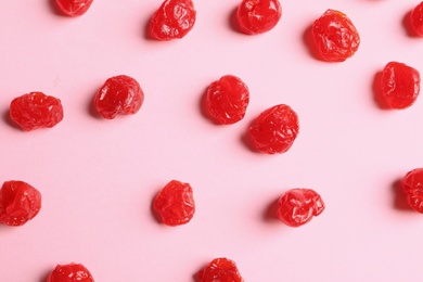 Photo of Flat lay composition of cherries on color background, closeup. Dried fruit as healthy snack