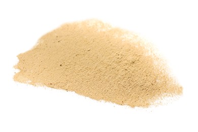 Photo of Pile of brown dust scattered on white background