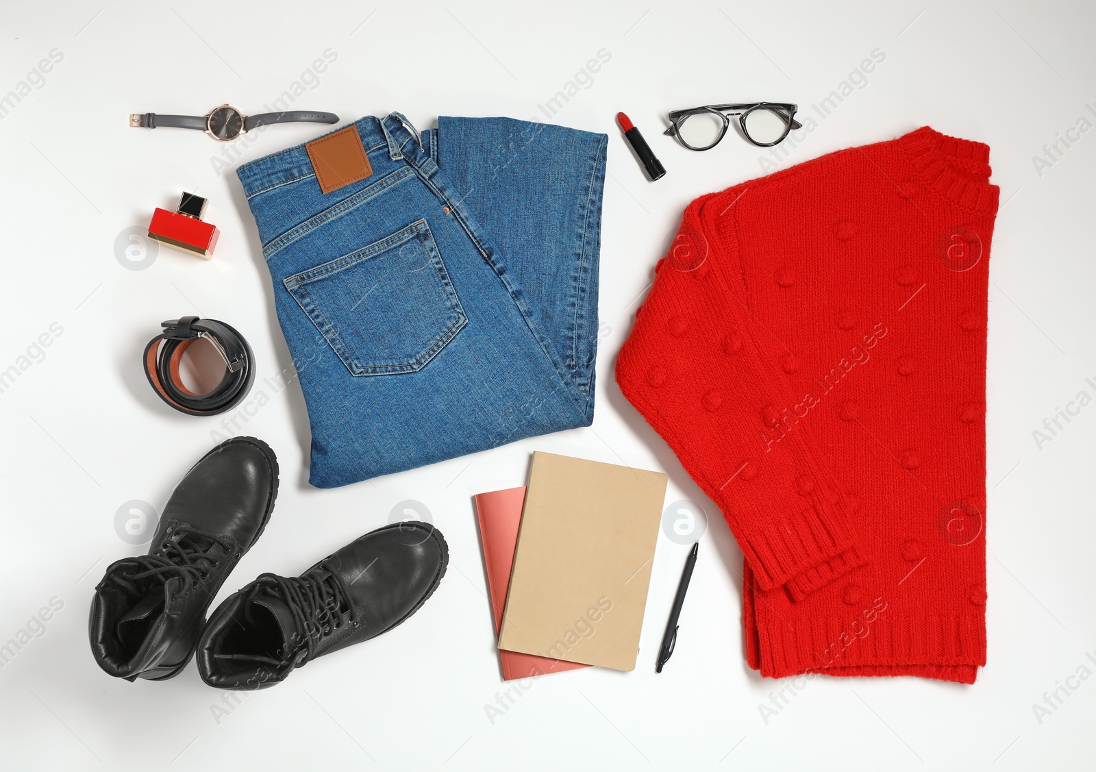 Photo of Flat lay composition with female winter clothes on white background