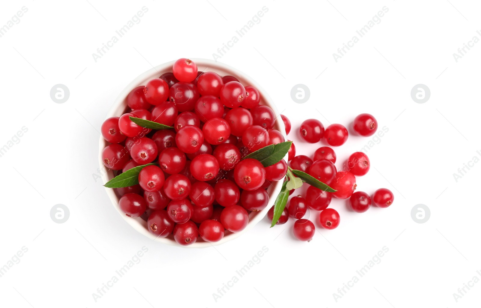 Photo of Pile of fresh ripe cranberries with leaves on white background, top view