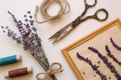 Photo of Flat lay composition with beautiful dried flowers on white background
