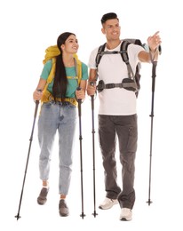 Photo of Couple of hikers with backpacks and trekking poles on white background
