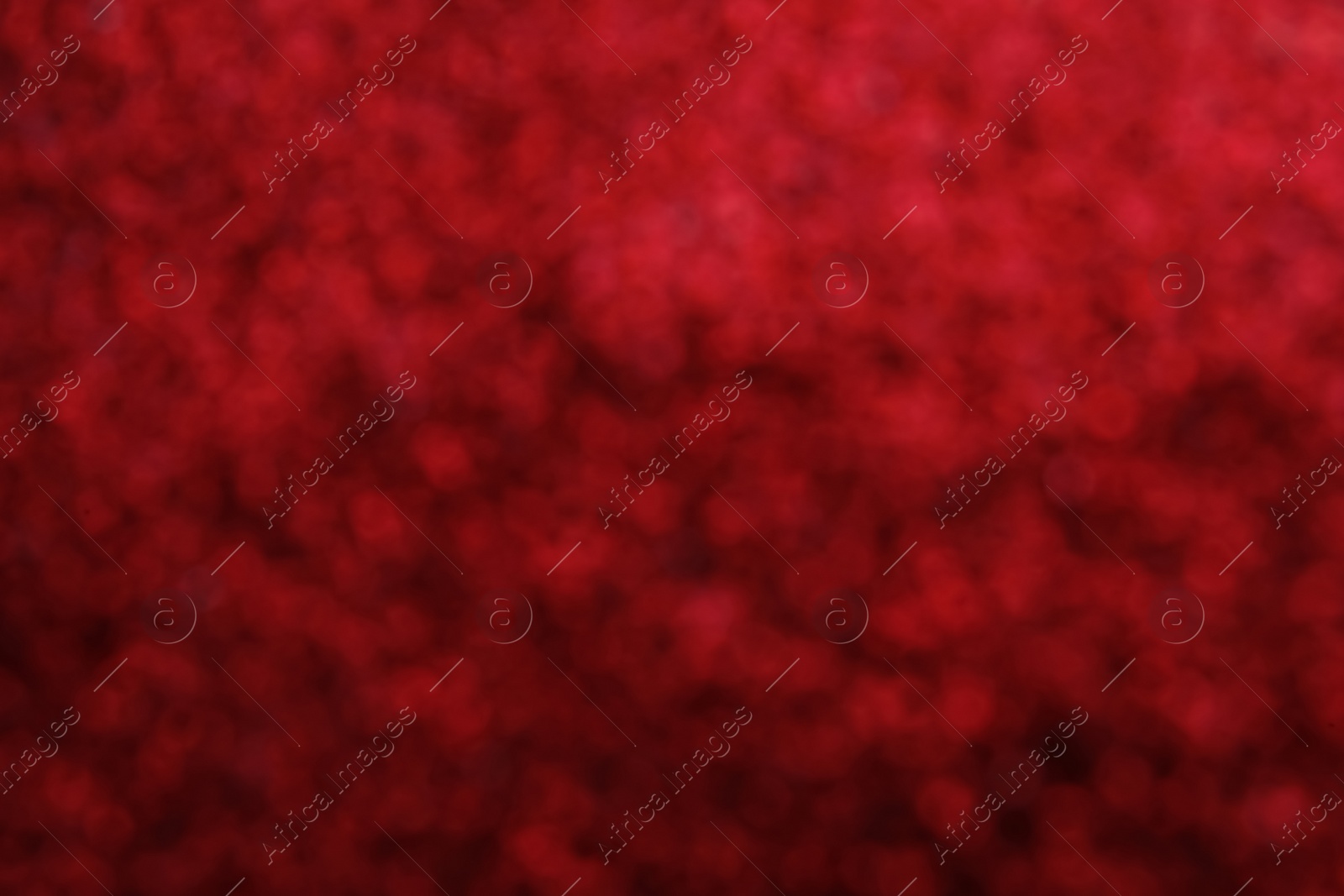 Photo of Shiny red background with magical bokeh effect