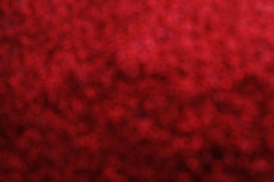 Photo of Shiny red background with magical bokeh effect