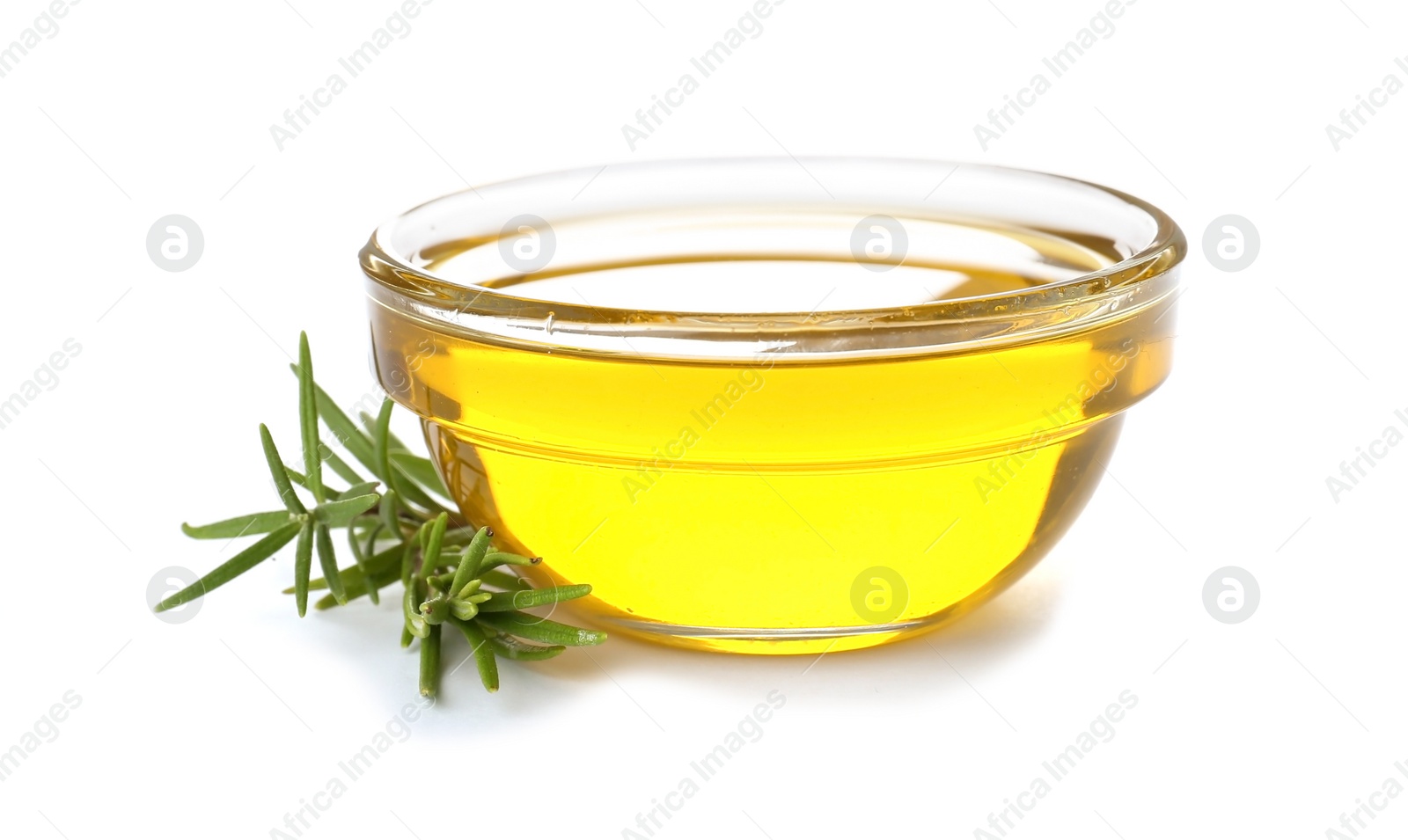 Photo of Bowl with rosemary oil on white background