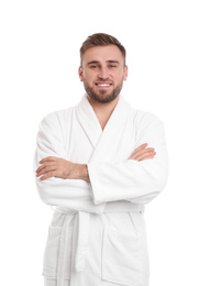 Handsome man wearing bathrobe on white background