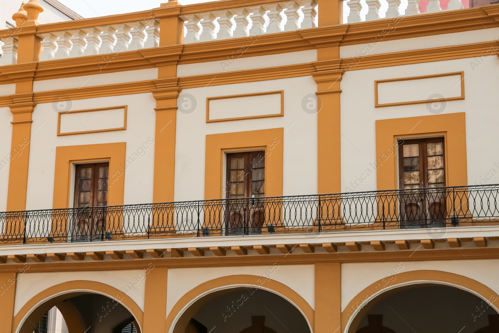 Photo of Exterior of building with windows and balcony