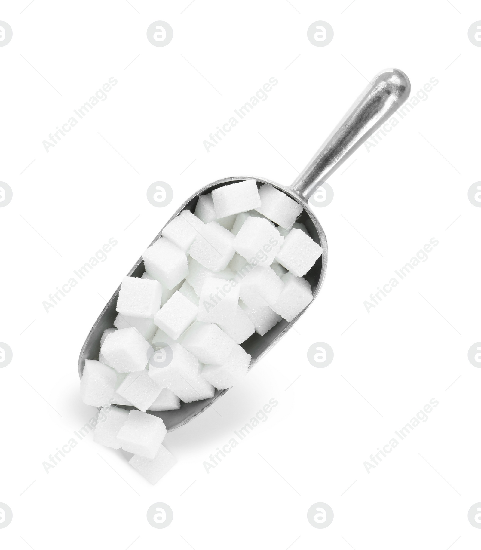 Photo of Sugar cubes in metal scoop isolated on white, top view