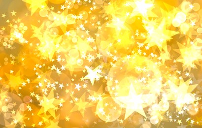 Many beautiful shimmering stars and blurred lights on golden background. Bokeh effect