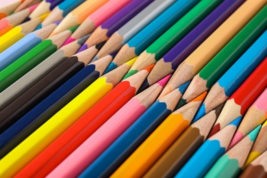 Photo of Different color pencils as background, closeup view