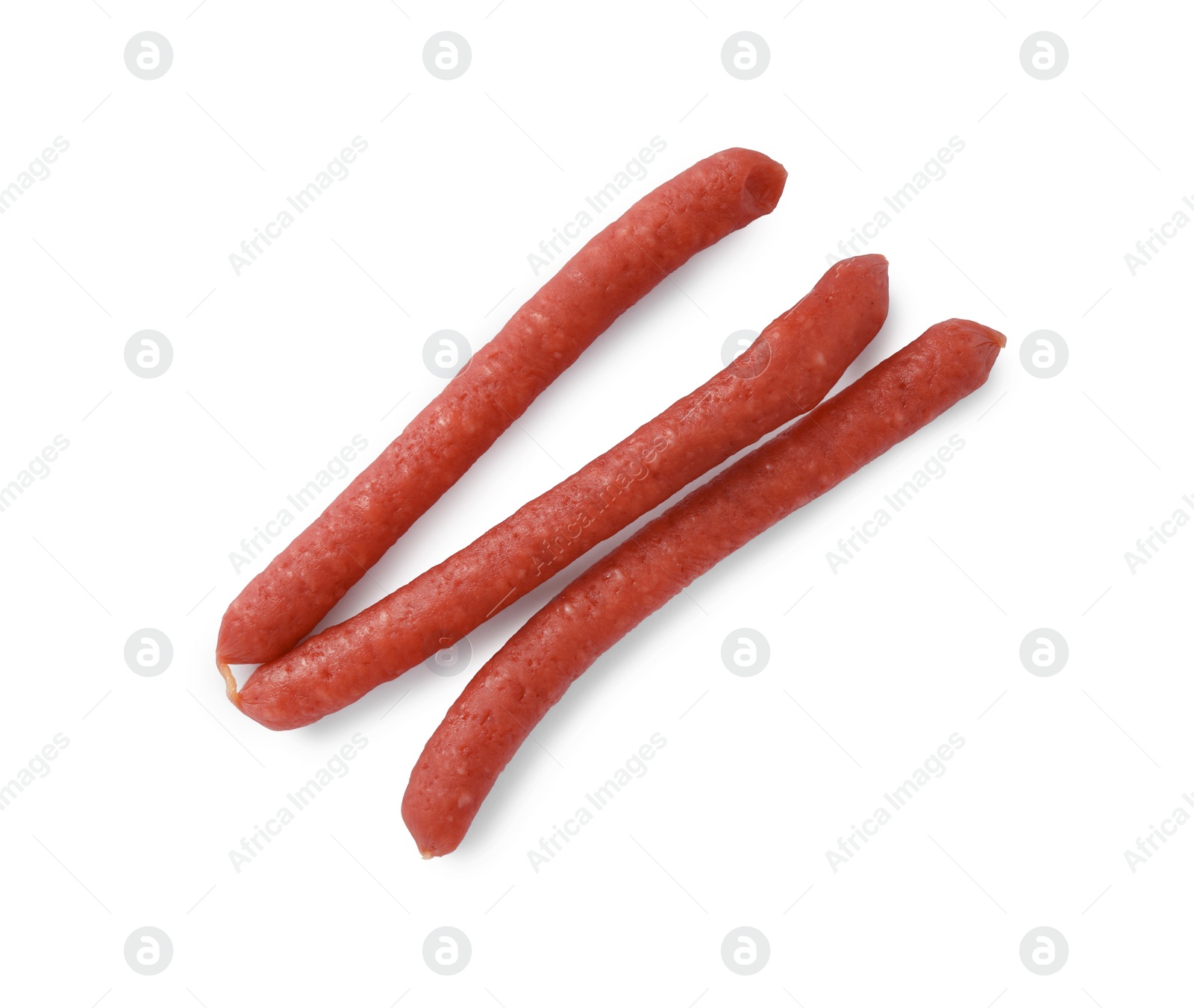 Photo of Thin dry smoked sausages isolated on white, top view