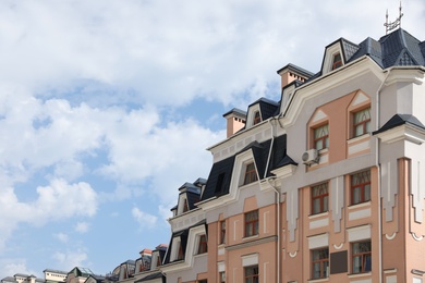 Photo of Buildings with beautiful windows in city on sunny day