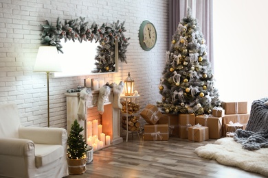 Photo of Stylish interior of living room with decorated Christmas tree