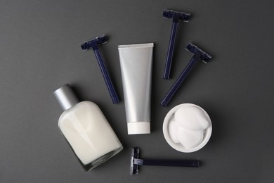 Photo of Flat lay composition with shaving accessories for men on grey background
