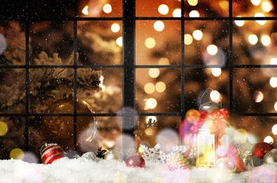 Image of Beautiful composition with Christmas lantern near window