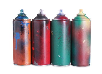 Photo of Many spray paint cans isolated on white