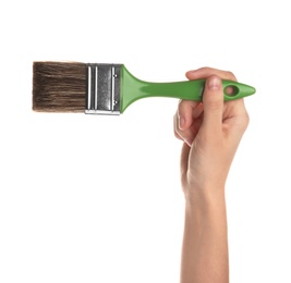 Photo of Woman holding paint brush on white background, closeup