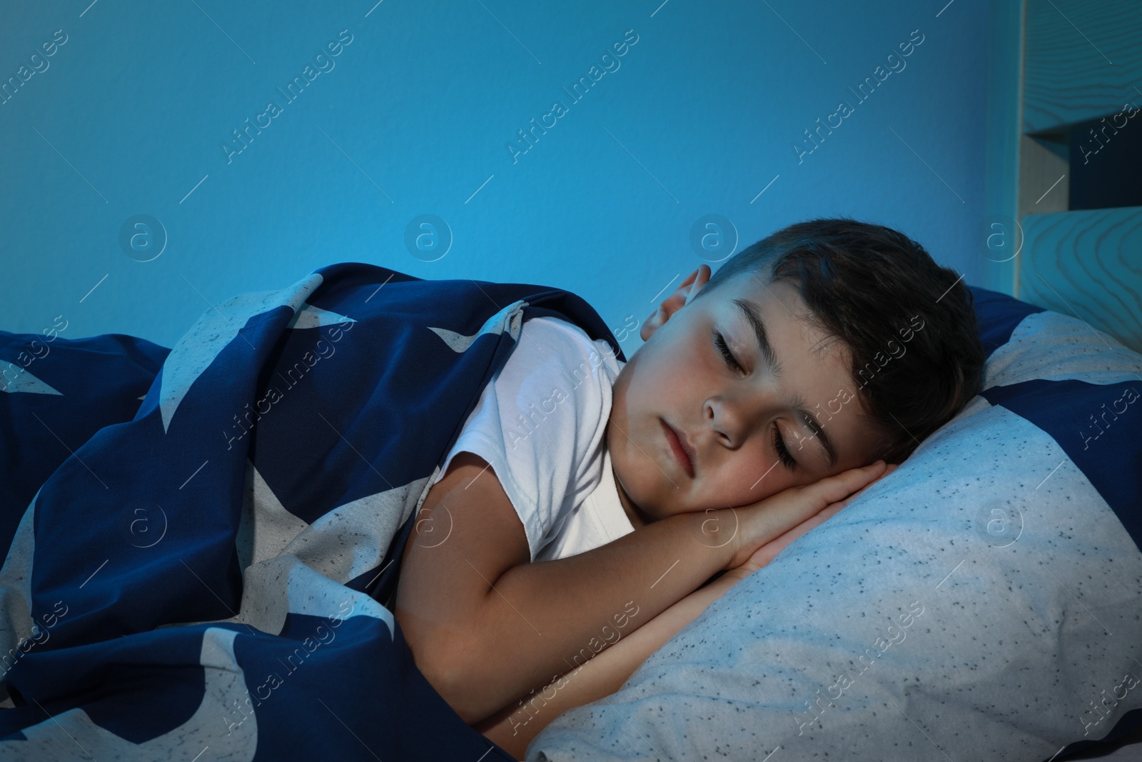 Photo of Cute little boy sleeping at home. Bedtime