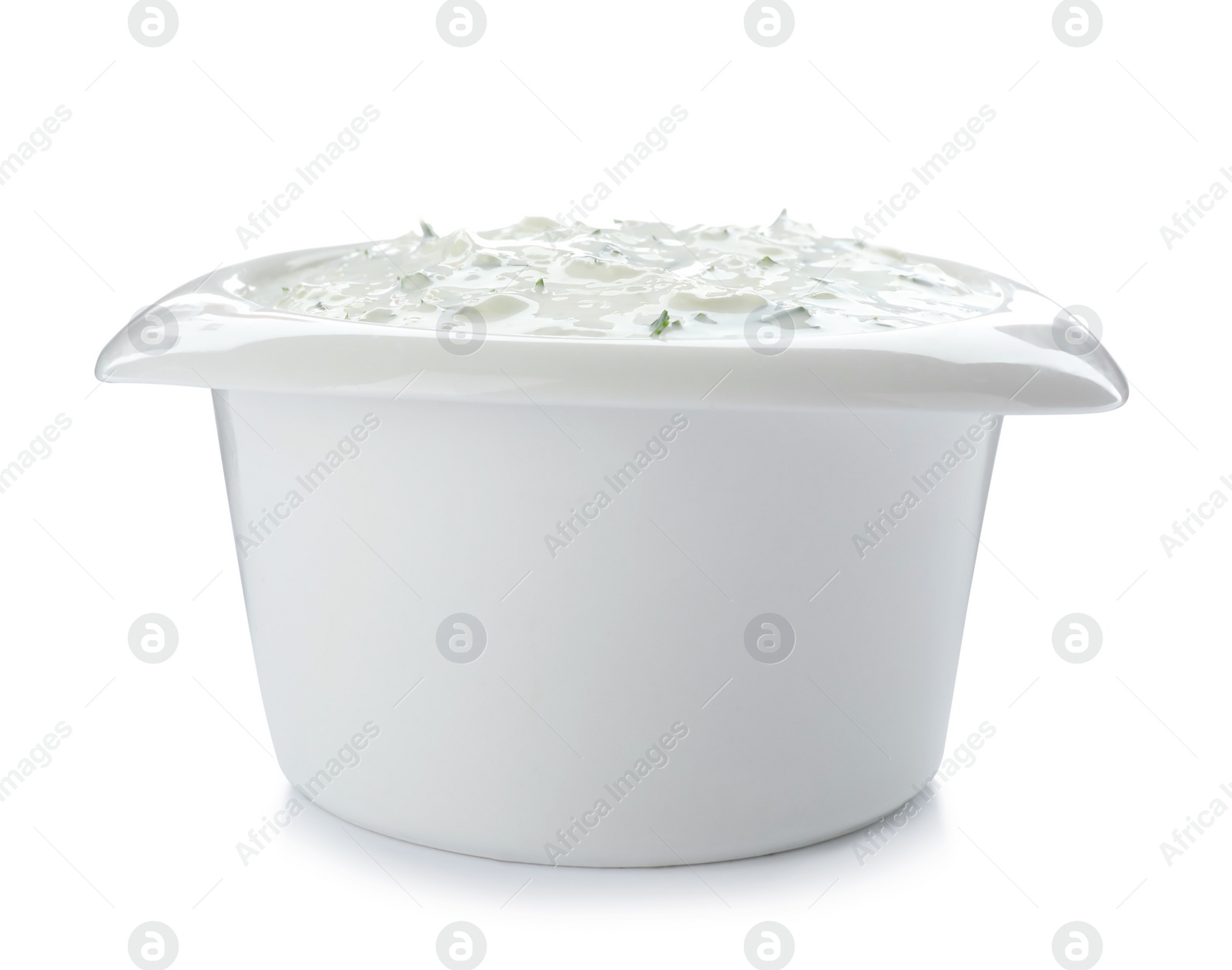 Photo of Bowl with cucumber sauce on white background