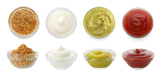 Image of Set of different sauces in bowls isolated on white, top and side views