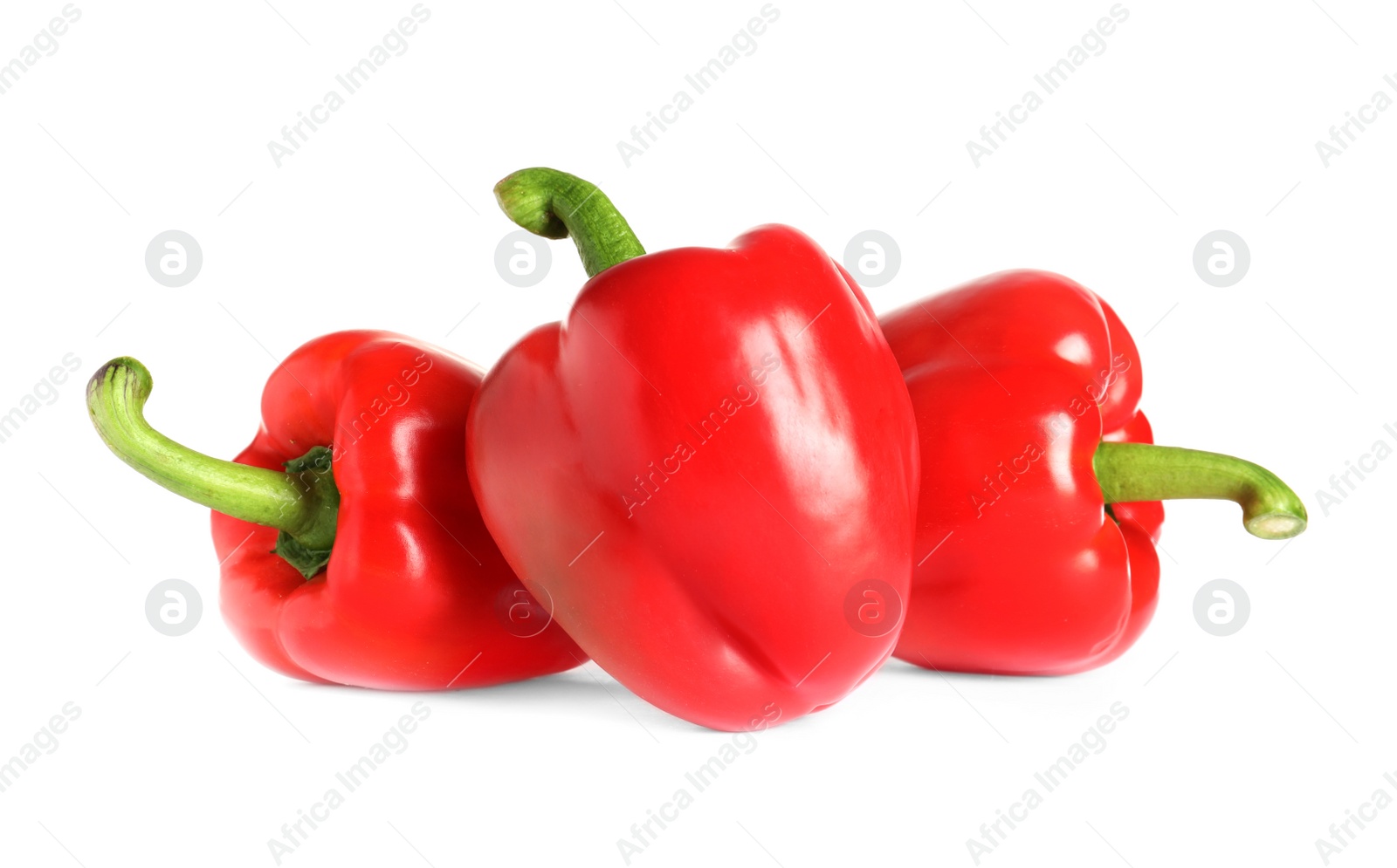 Photo of Tasty ripe red bell peppers on white background