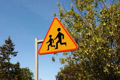 Road sign Children outdoors on sunny day