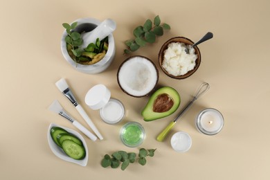 Photo of Flat lay composition with homemade cosmetic products and fresh ingredients on beige background. DIY beauty recipe