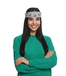 Young woman wearing stylish bandana on white background