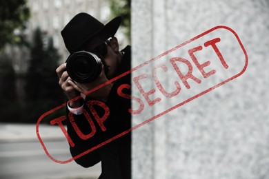 Image of Classified information. Private detective with camera investigating on city street. Stamp Top Secret