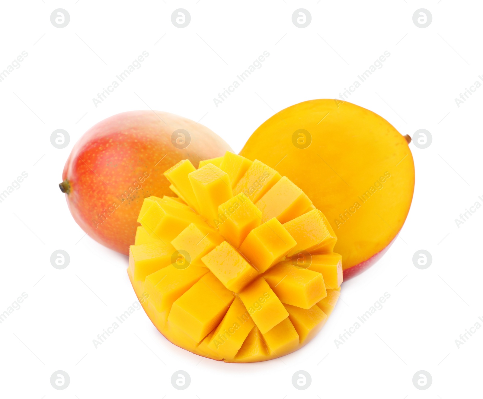 Photo of Whole and cut ripe mangoes isolated on white. Exotic fruit