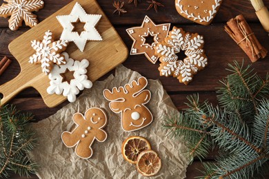 Photo of Flat lay composition with delicious homemade Christmas cookies on wooden table