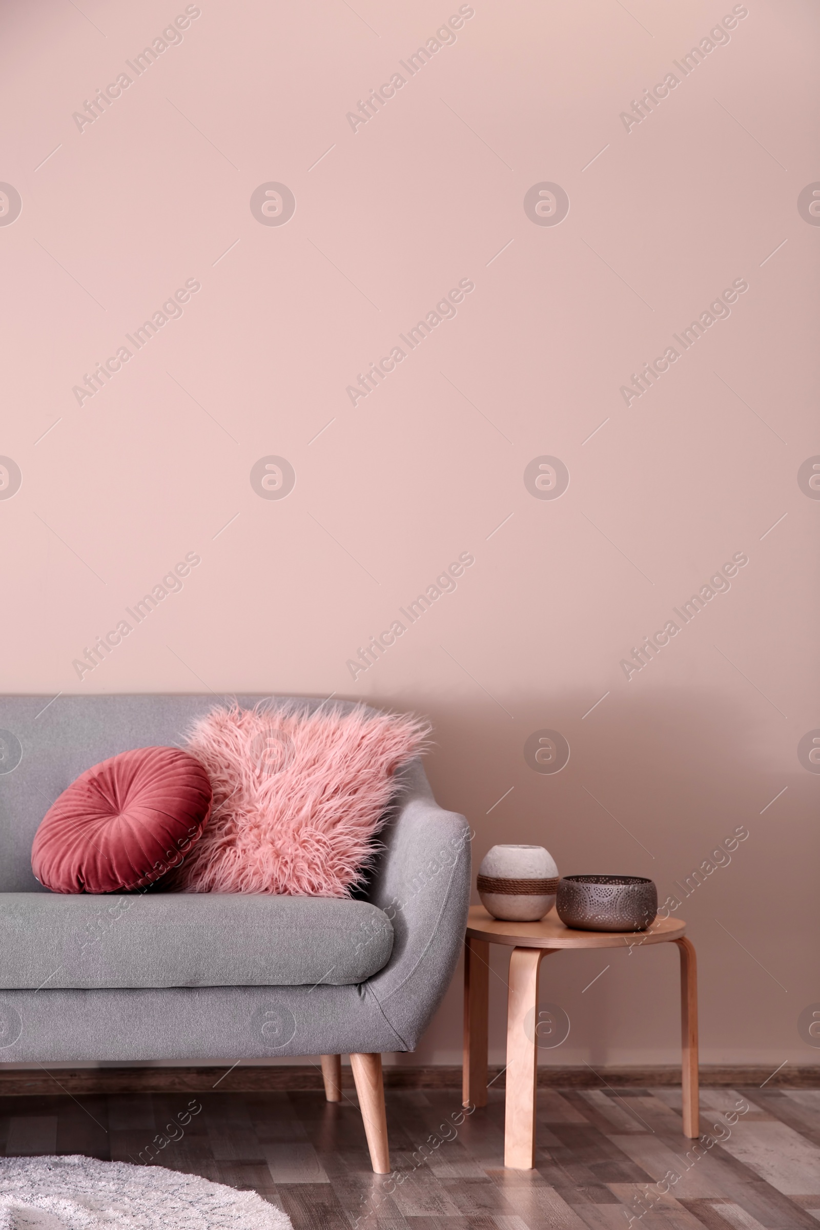 Photo of Modern living room interior with comfortable sofa. Space for text