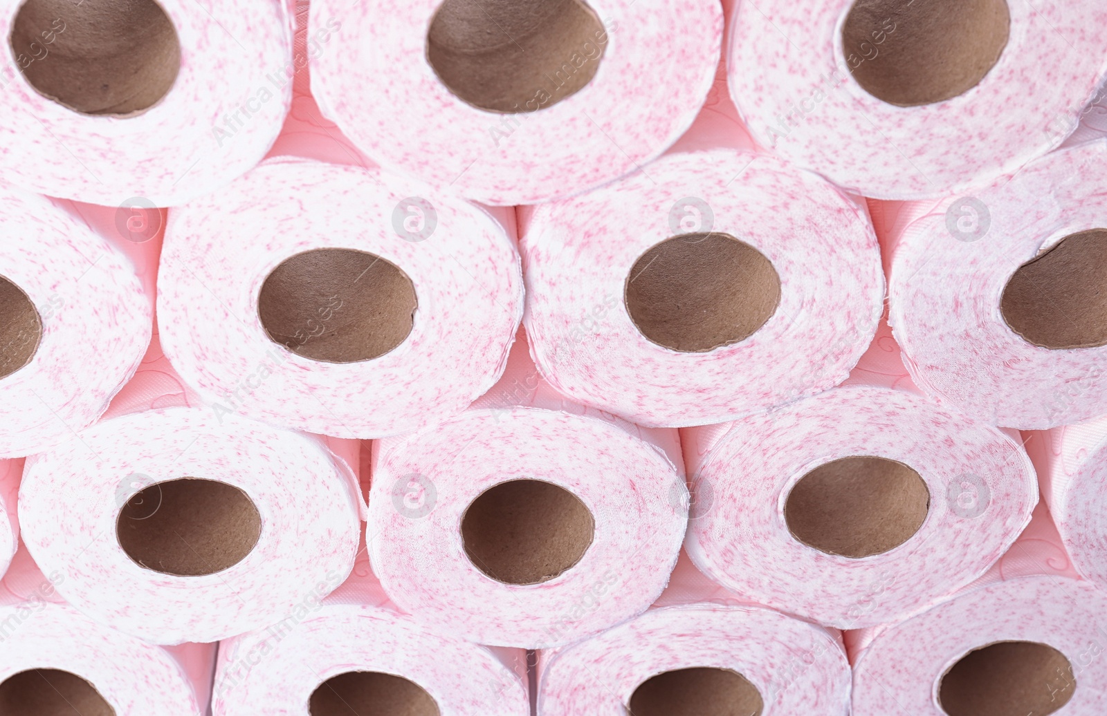 Photo of Many rolls of toilet paper as background. Personal hygiene