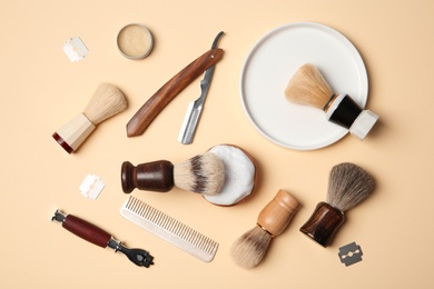 Flat lay composition with shaving accessories for men on color background