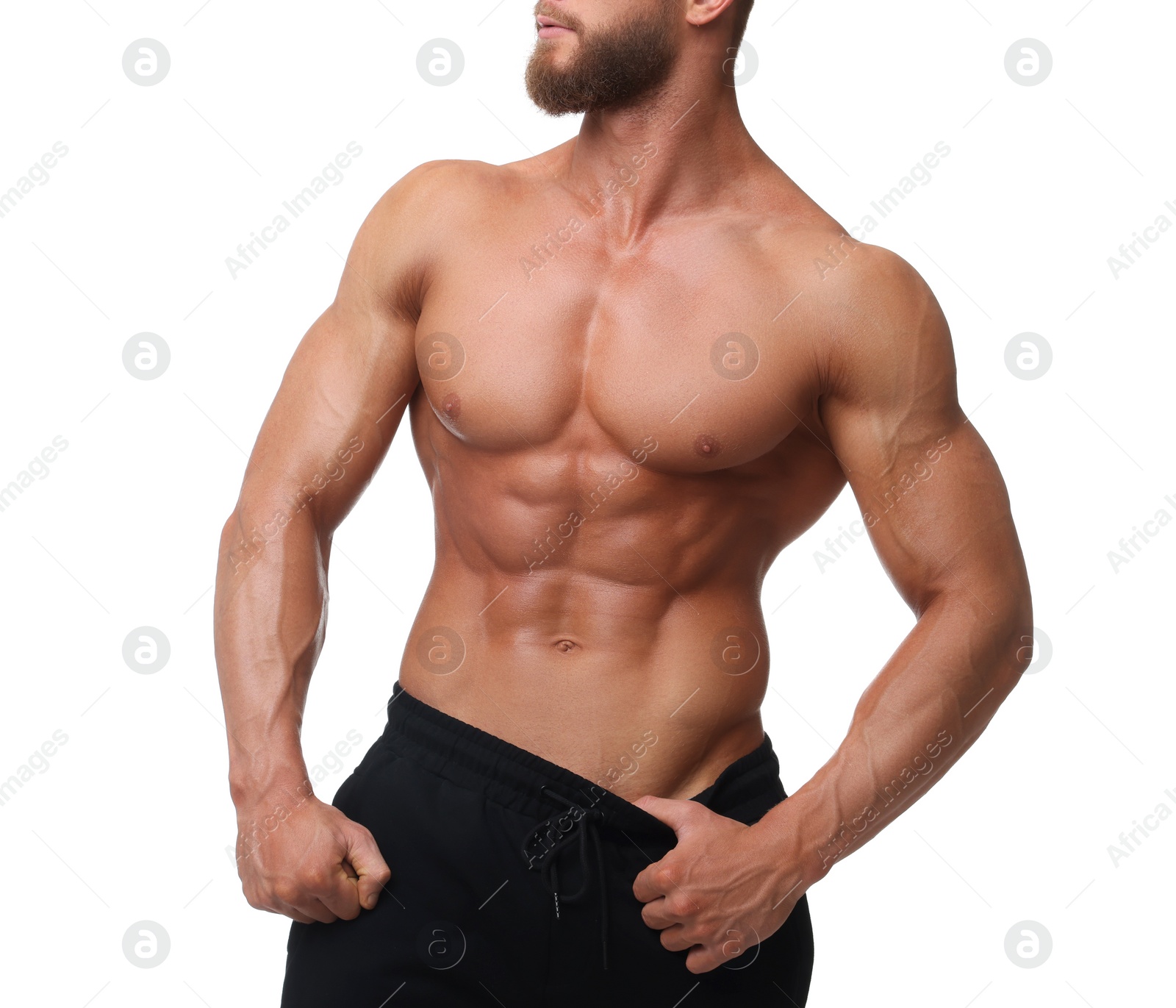 Photo of Young bodybuilder with muscular body on white background, closeup