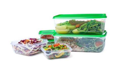 Photo of Plastic containers with fresh food on white background