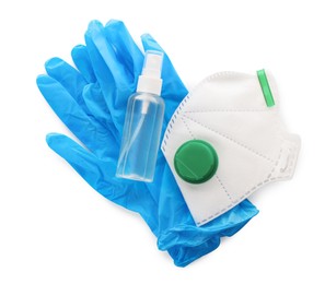 Respirator, medical gloves and antiseptic on white background, top view