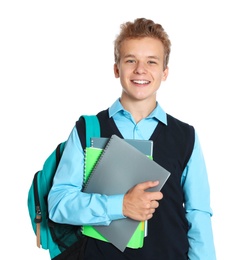 Happy boy in school uniform on white background