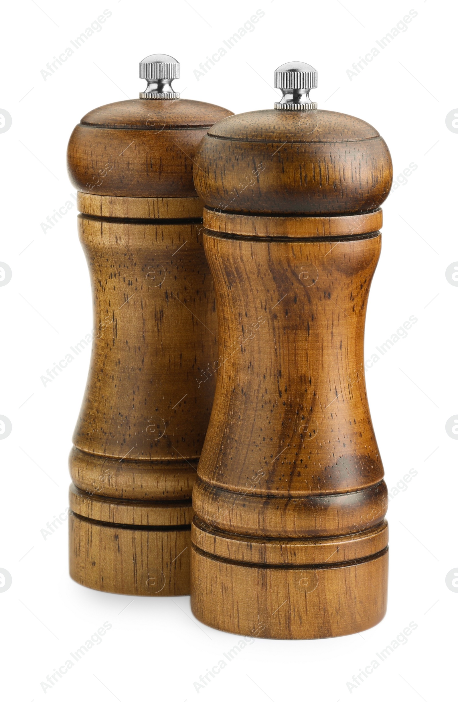 Photo of Wooden salt and pepper shakers isolated on white