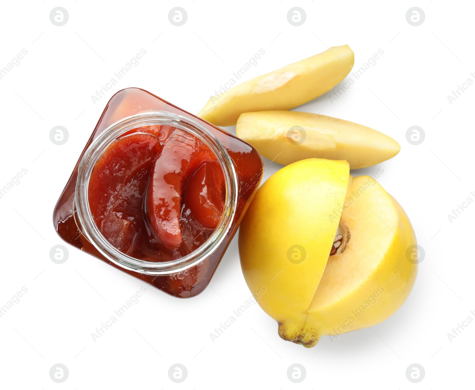 Photo of Tasty homemade quince jam in jar and fruits isolated on white, top view