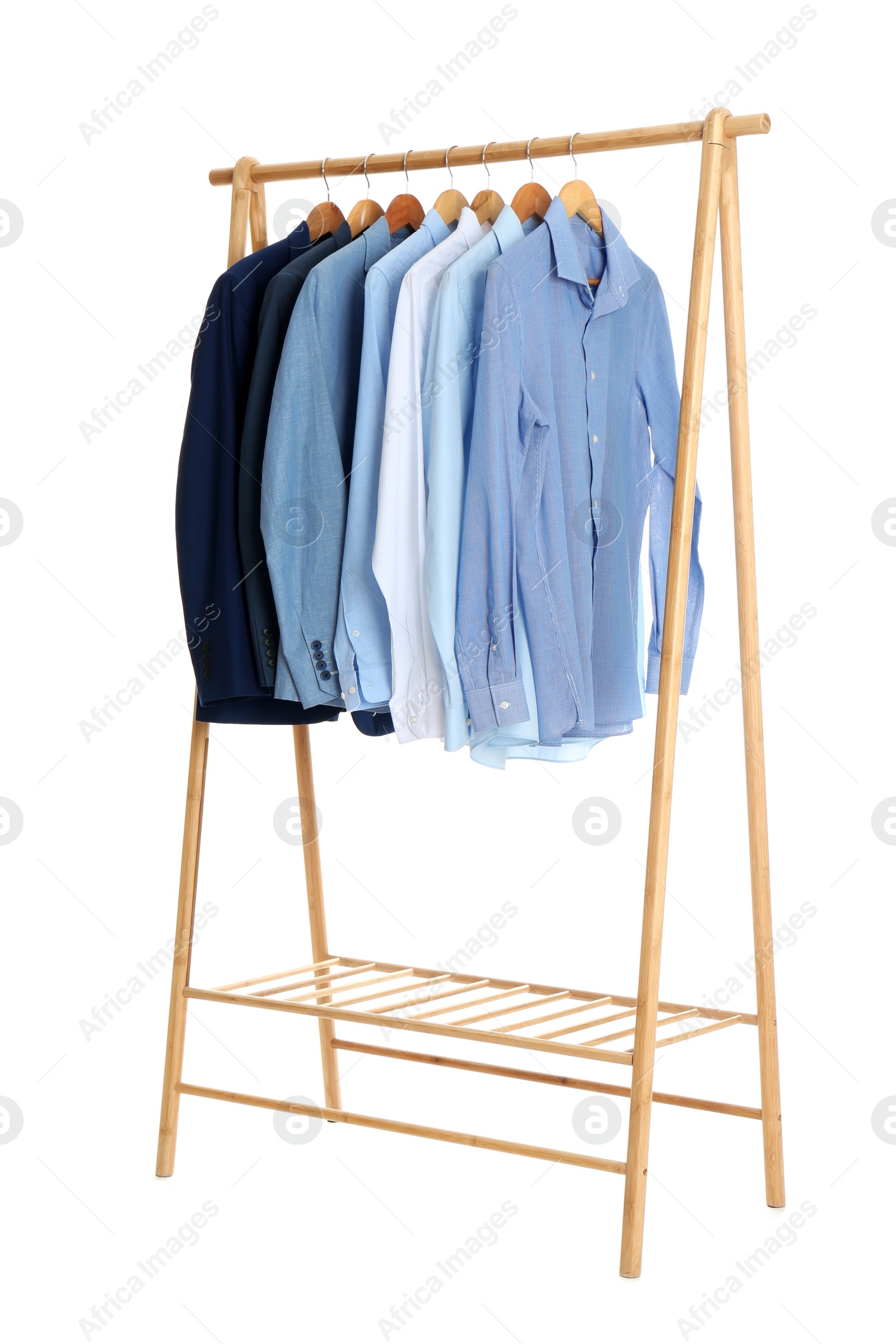 Photo of Rack with stylish shirts isolated on white