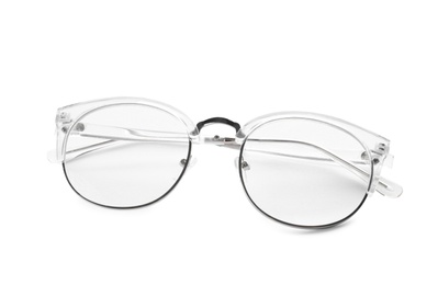 Photo of Glasses with corrective lenses on white background. Vision problem