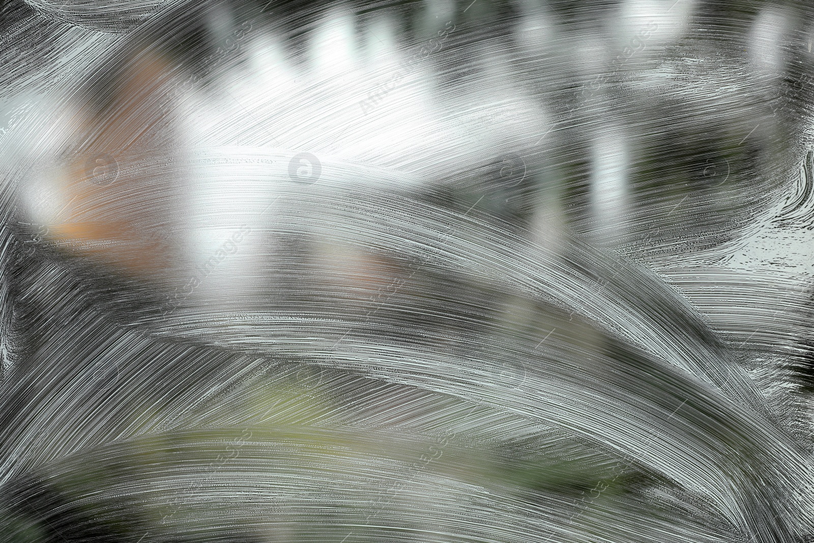 Photo of Cleaning foam on window glass, closeup view