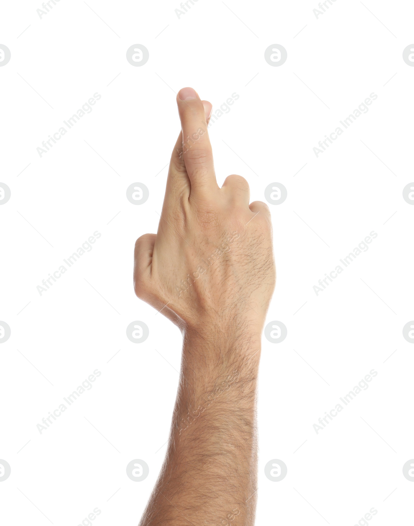 Photo of Man with crossed fingers on white background, closeup. Superstition concept