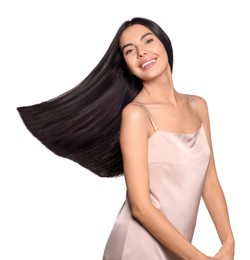 Portrait of beautiful young woman with healthy strong hair on white background