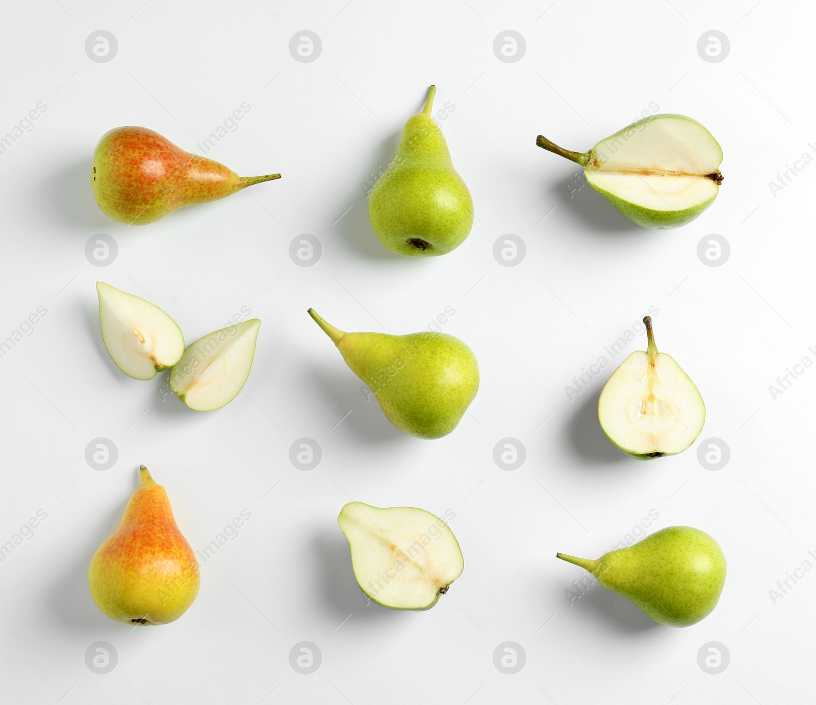 Photo of Fresh pears on light background, flat lay composition