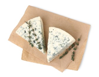 Tasty blue cheese with thyme isolated on white, top view