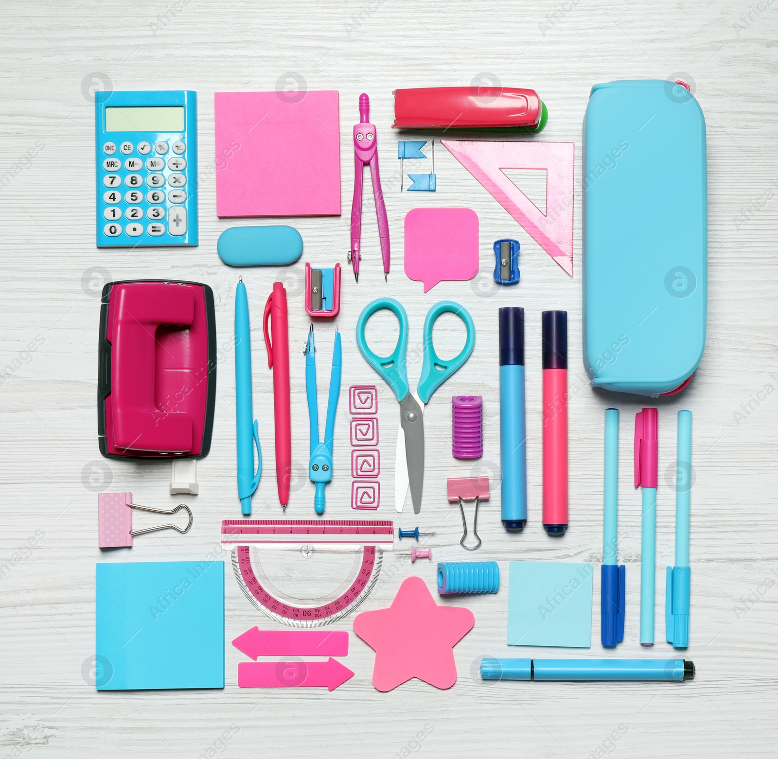 Photo of Different stationery on white wooden background, flat lay