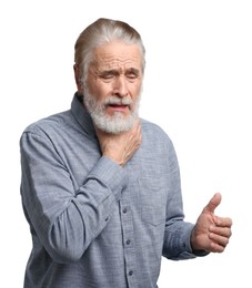 Photo of Senior man suffering from sore throat on white background. Cold symptoms