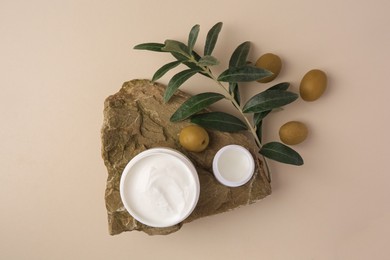 Photo of Flat lay composition with different natural cosmetic products on beige background